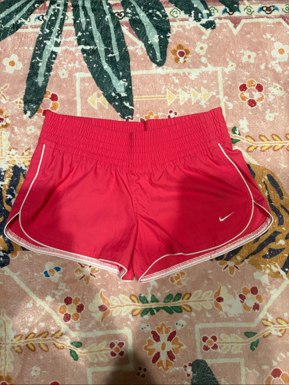 Nike Women's Pink Athletic Running Shorts with White Piping - Low-Rise